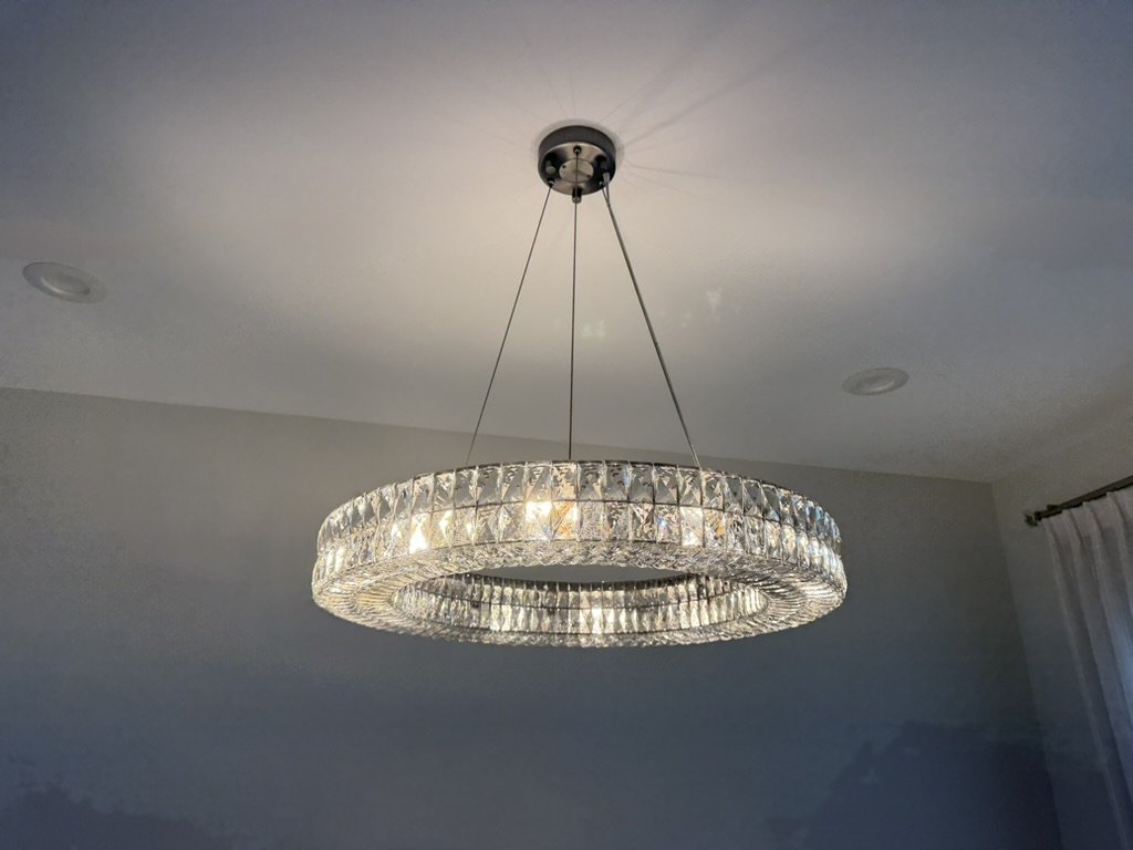 Residential chandelier services in a Florida home